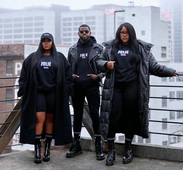 a group of people standing on a balcony